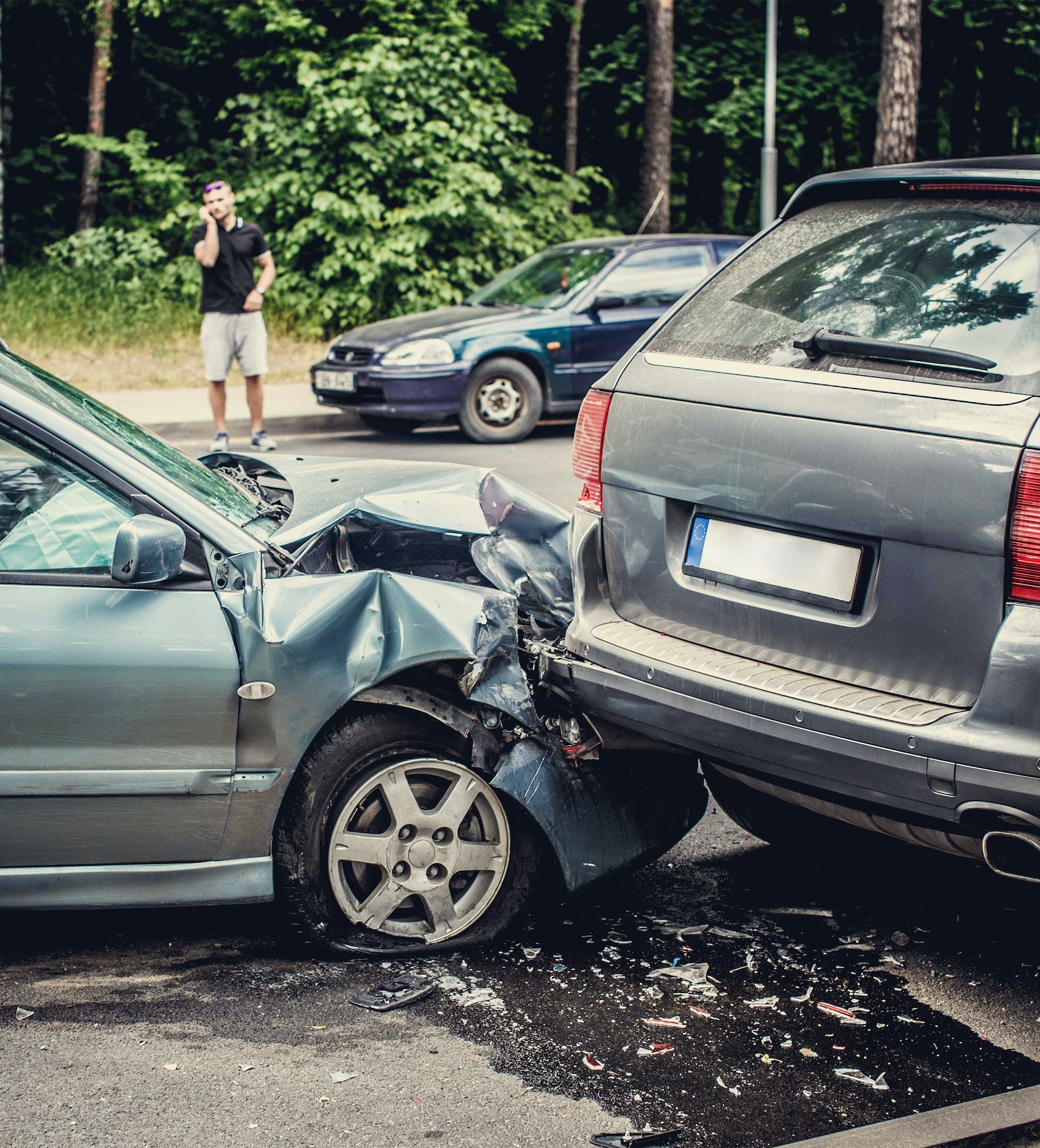 Close up smached cars on a road.