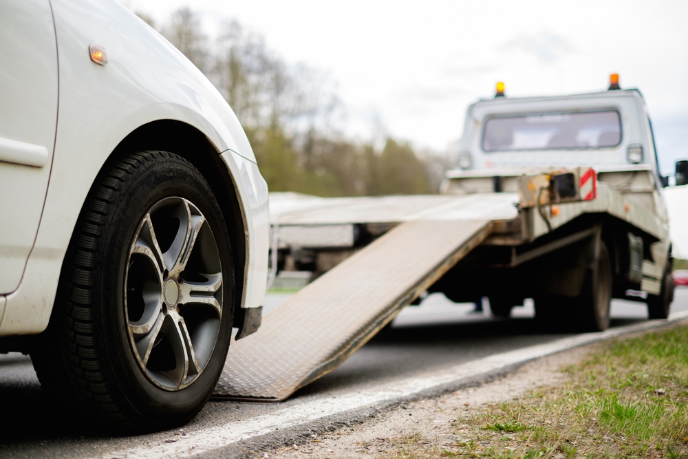 Loading,Broken,Car,On,A,Tow,Truck,On,A,Roadside